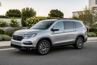 Used Honda Pilot parked on a suburban road for reliability and cost-to-own guide