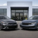 Used Kia Forte and Honda Civic parked side by side for a compact sedan comparison