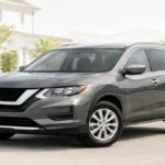 Used Nissan Rogue parked in a clean driveway for a reliability and ownership guide