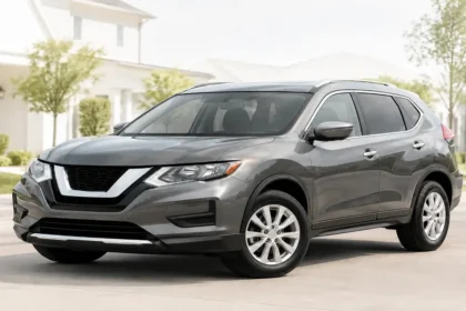 Used Nissan Rogue parked in a clean driveway for a reliability and ownership guide